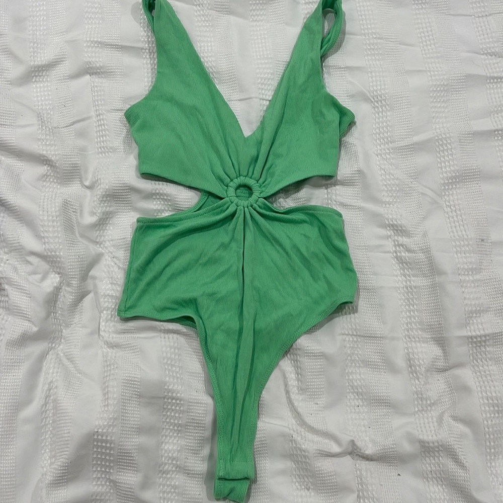 Green body suit, size medium